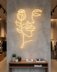 Néon LED mural visage de femme et rose line art pour déco murale élégante